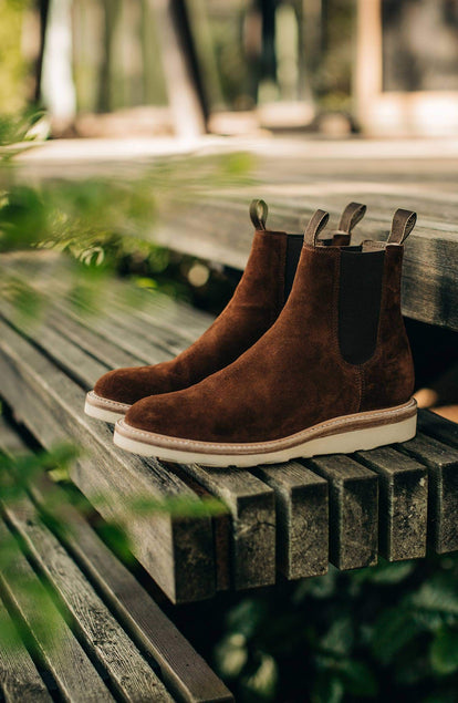 our model wearing the boots in the PNW—two images, onse cropped and close up