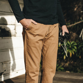 Our fit model wearing The Democratic Chino in Organic British Khaki.