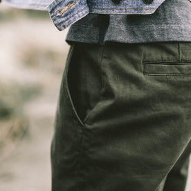 Our fit model wearing The Democratic Chino in Organic Olive.
