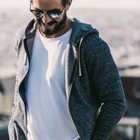 The fit model showing the Apres Hoodie unzipped
