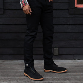 our fit model wearing The Slim Jean in Black Selvage