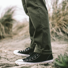 Our fit model wearing The Slim Chino in Organic Olive.