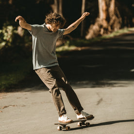 Our fit model wearing The Heavy Bag Tee in Grey Stripe.