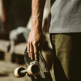 Our fit model wearing The Heavy Bag Tee in Grey Stripe.
