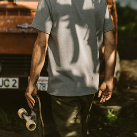 Our fit model wearing The Heavy Bag Tee in Grey Stripe.