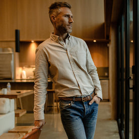 fit model looking out the window while wearing The Jack in Natural Oxford