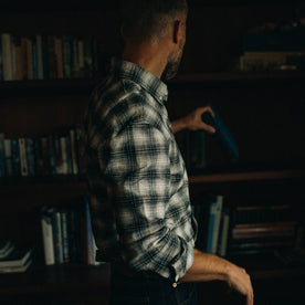 fit model taking book in The Jack in Navy Plaid