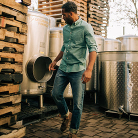 fit model near storage chambers wearing The Jack in Teal Oxford