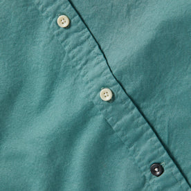 material shot of front placket of The Jack in Teal Oxford