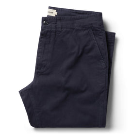 folded flatlay of The Slim Foundation Pant in Dark Navy