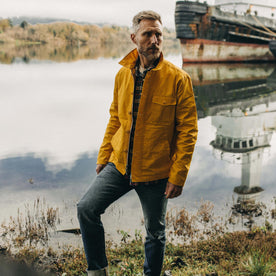 fit model wearing The Watts Jacket in Canary open and with the collar popped