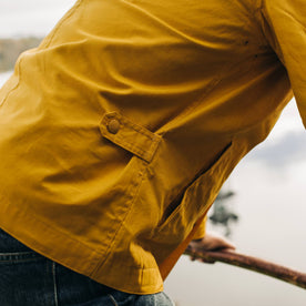 fit model showing back buttons of The Watts Jacket in Canary