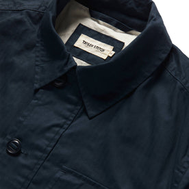 material shot of interior front label of The Watts Jacket in Dark Navy