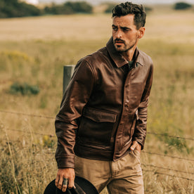 fit model wearing The Hangar Jacket in Espresso, looking left