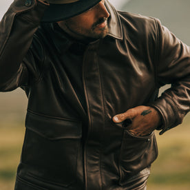 fit model wearing The Hangar Jacket in Espresso, hand in front pocket