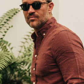 fit model wearing The Jack in Rust Linen, cropped, forehead down