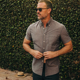 fit model wearing The Short Sleeve Jack in Cocoa Dobby, slightly unbuttoned by pool
