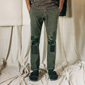 material shot of The Atelier and Repairs Chino in Olive, cuffed on model