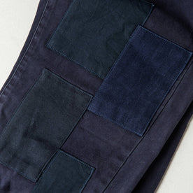 material shot of The Atelier and Repairs Chino in Navy, patches on front