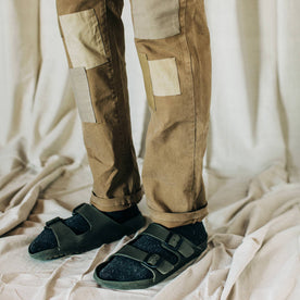 material shot of The Atelier and Repairs Chino in British Khaki, model wearing chinos with birks