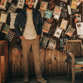 fit model wearing The Camp Pant in Stone Boss Duck, hands in pockets
