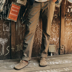 fit model wearing The Camp Pant in Stone Boss Duck, cuffed with birks