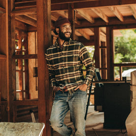 fit model wearing The Crater Shirt in Forest Plaid, looking right