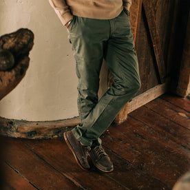 fit model wearing Foundation Pant, indoors with sweater