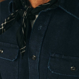fit model wearing The Division Shirt in Indigo Twill from Taylor Stitch, chest detail