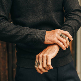 fit model wearing The Double Knit Sweater in Charcoal, sleeve detail