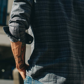 fit model wearing The Jack in Navy Slub, cuffed left sleeve