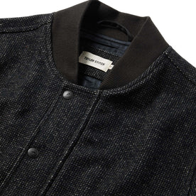 material shot of The Bomber Jacket in Charcoal Wool showing collar and label