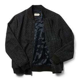 flatlay of The Bomber Jacket in Charcoal Wool open from the front showing lining