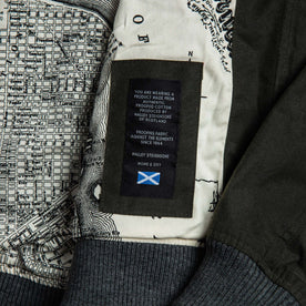 material shot of The Bomber Jacket in Waxed Olive with halley stevensons waxed label