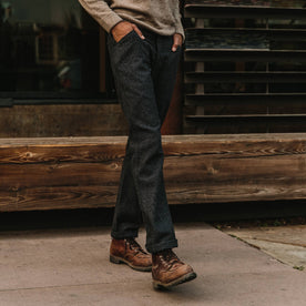 fit model wearing The Camp Pant in Navy Nep Wool, hands in pockets