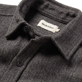 material shot of The Explorer Shirt in Coal Herringbone Wool showing interior label