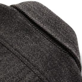 material shot of The Explorer Shirt in Coal Herringbone Wool showing back collar and the herringbone weave