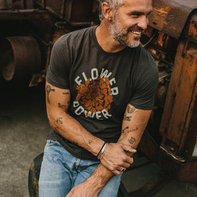 fit model wearing The Cotton Hemp Tee in Flower Power with arms crossed