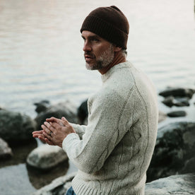 fit model wearing The Lodge, hands clasped