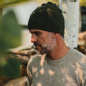 fit model wearing The Lodge, looking left