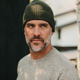 fit model wearing The Lodge, up close, looking right