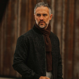 fit model wearing The Lodge, looking left