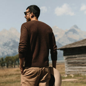 fit model wearing the lodge sweater, back, walking away from camera