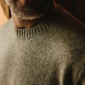fit model wearing the lodge sweater, chest