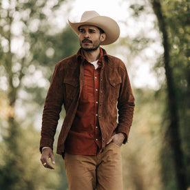 fit model wearing The Western Shirt in Espresso Suede in a forest