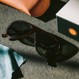material shot of The Surf Aviator in Dark Tortoise next to box