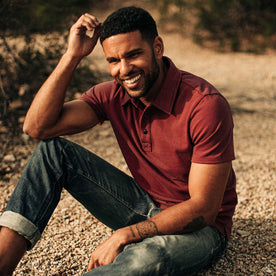 our fit model wearing The Heavy Bag Polo in Red Stripe