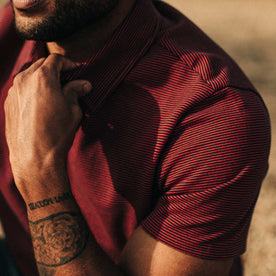 our fit model wearing The Heavy Bag Polo in Red Stripe