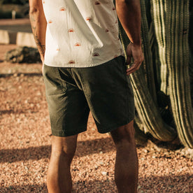 our fit model wearing The Camp Short in Olive Boss Duck