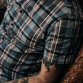 Fit model close up lounging on chair
